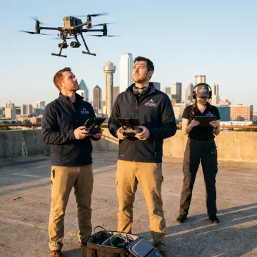 Drone filming aerial video over Dallas skyline