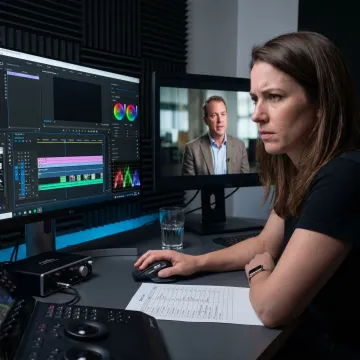 Documentary editor reviewing interview footage