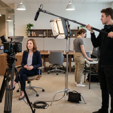 HR video production crew filming employee interview