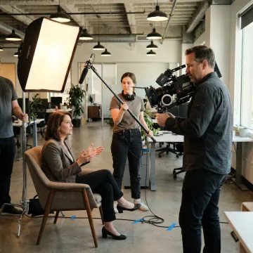 Documentary film crew interviewing a subject in the Bay Area