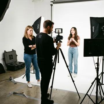 Creator filming a TikTok product video