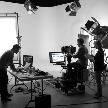 SaaS explainer video production team reviewing a software demo