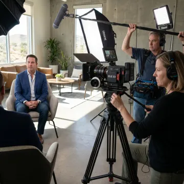 Corporate video crew filming an interview in Albuquerque