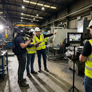 Producer planning a factory video shoot
