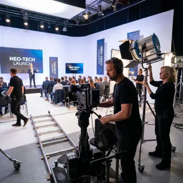 Launch event video production crew filming a product reveal