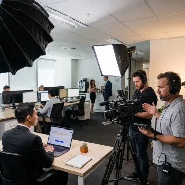 Producer directing HR employee video shoot