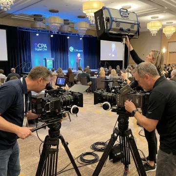 Corporate event production crew filming a Salt Lake City conference