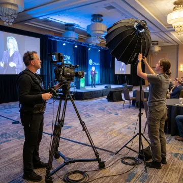 Event videographer filming a Cleveland conference