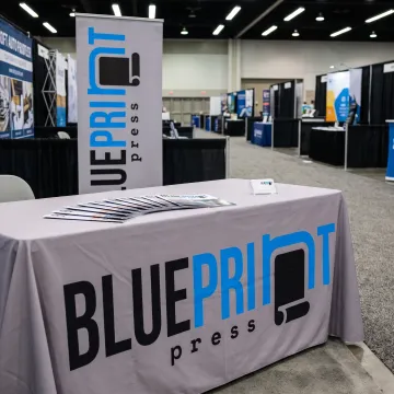 Branded tablecloth at a trade show booth