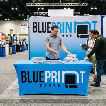 Branded tablecloth at a trade show booth