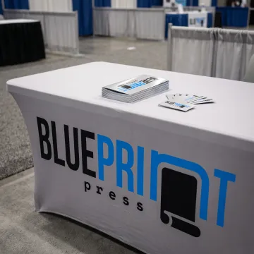 Custom printed table cover with vibrant branding
