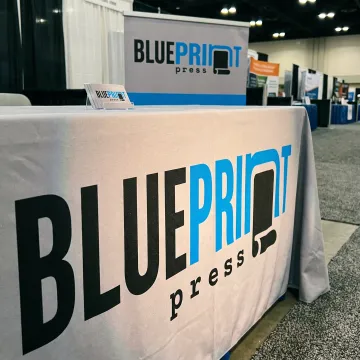 Custom logo tablecloth display
