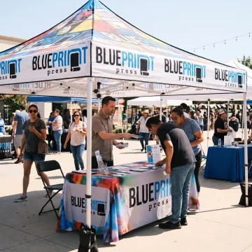 Branded pop up canopy tent at an outdoor event