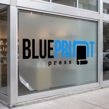 Custom removable vinyl sign displayed in a storefront