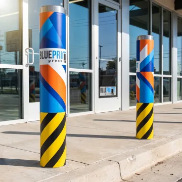 Custom branded bollard signs in a parking area