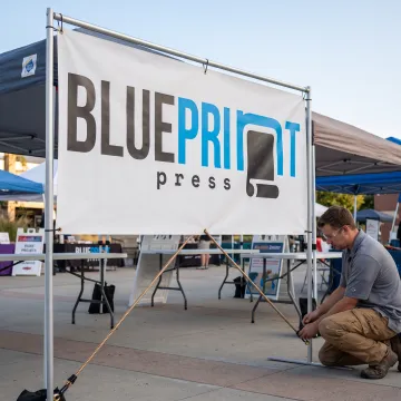Vibrant custom vinyl banner displayed outdoors
