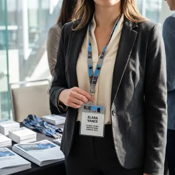 Event attendee wearing a branded lanyard