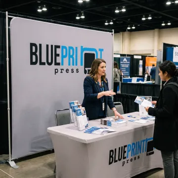 Branded banner at a career fair booth