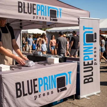 Custom branded food booth canopy and table display