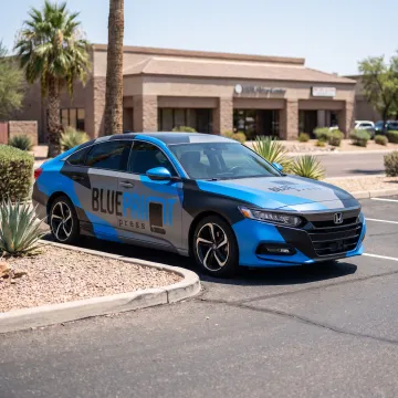 Branded business vehicle with colorful custom wrap