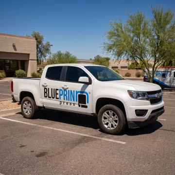 Branded work truck with custom vinyl lettering