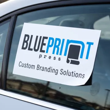 Custom static window cling displayed on a car window