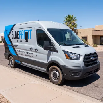 Branded business van with a colorful vinyl wrap