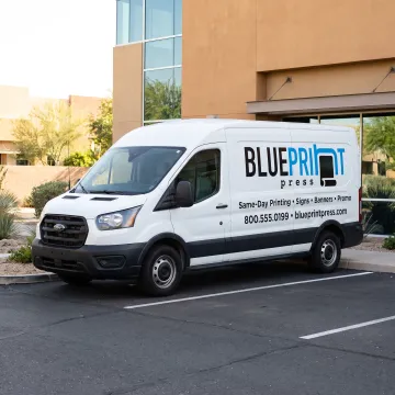 Colorful custom vinyl graphics on a branded van