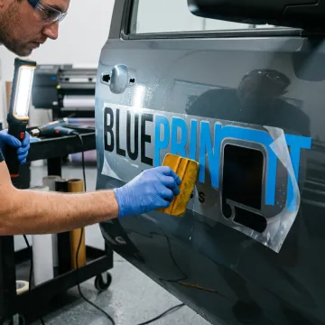 Custom vinyl decal applied to a business vehicle