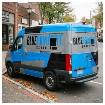 Branded commercial van with a colorful vehicle wrap