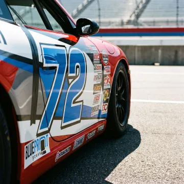Race car with custom sponsor decals