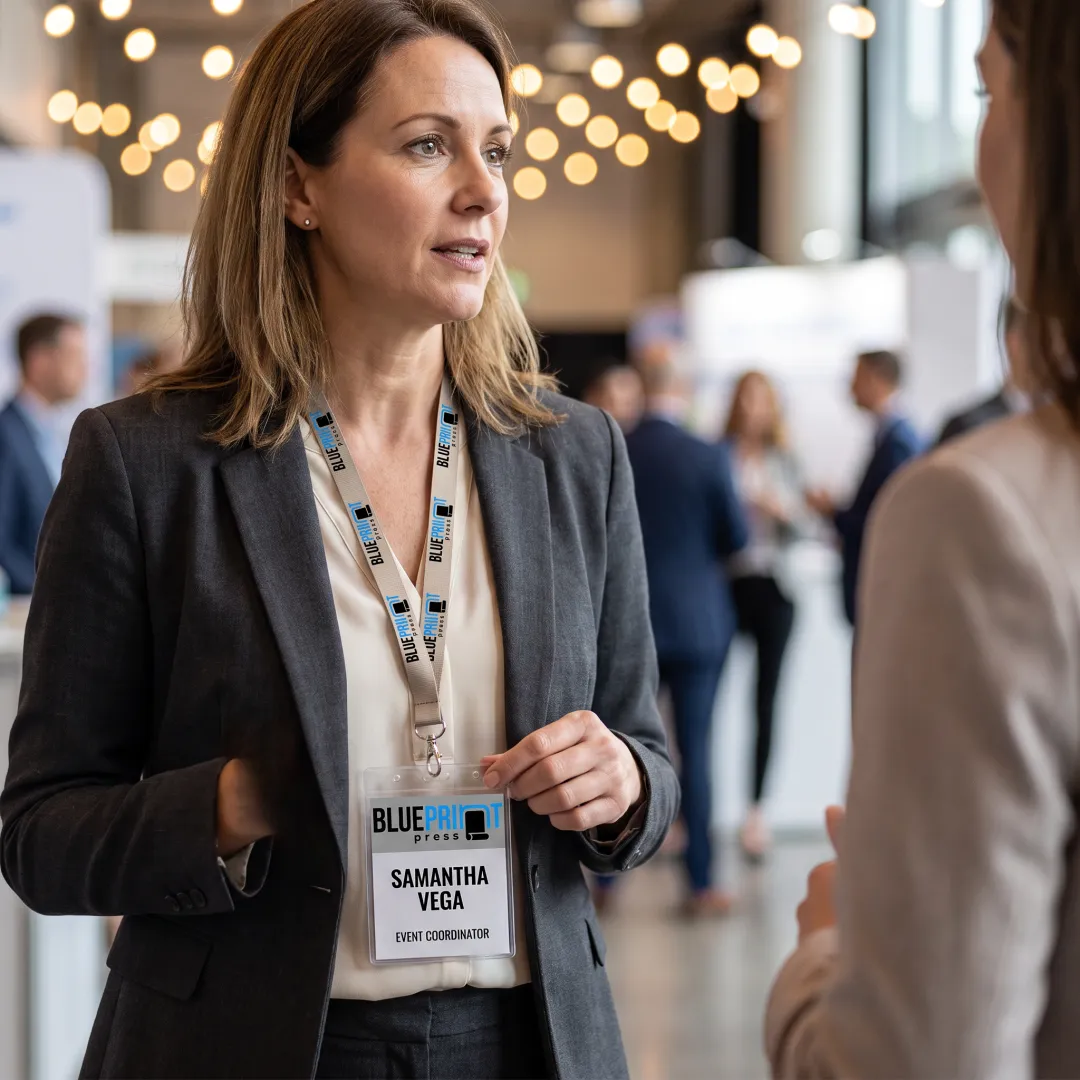 Branded name badge being worn at a business event