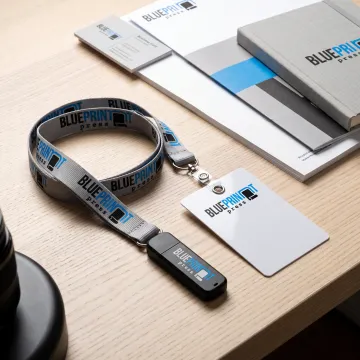 Custom logo lanyard holding a USB flash drive