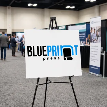 Custom foam board sign displayed at an event