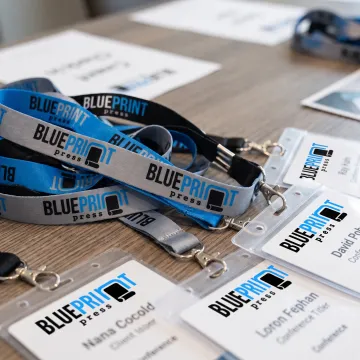 Custom branded tubular lanyards with event badges