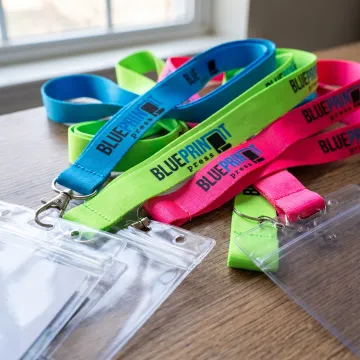Bright custom neon lanyards with branded event badges