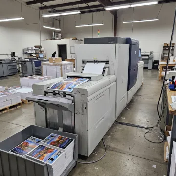 Digital printer producing colorful business graphics