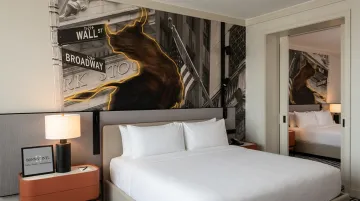 Custom large-scale hotel wallpaper mural installation across multiple guest rooms