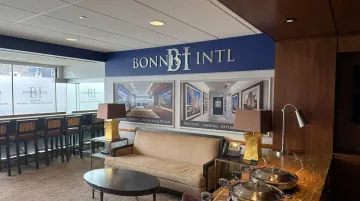 Large-format custom spatial branding installation inside branded sports venue corridor
