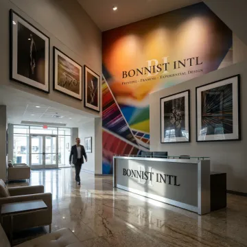 Custom vinyl wall wrap in a branded commercial space