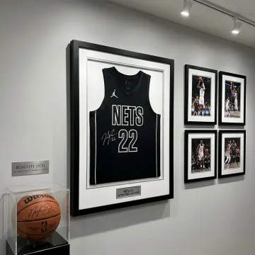 Custom framed autographed sports memorabilia display