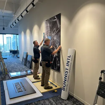 Professional art installation in a branded commercial space