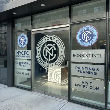 Custom vinyl window graphics on storefront glass