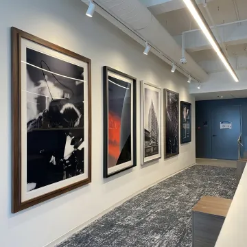 Custom framed artwork in a corporate interior