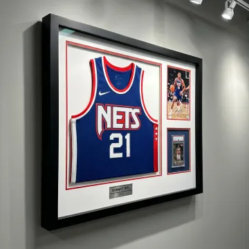 Custom framed sports jersey in a professional display case