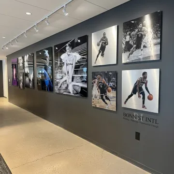 Custom acrylic and metal photo prints on display