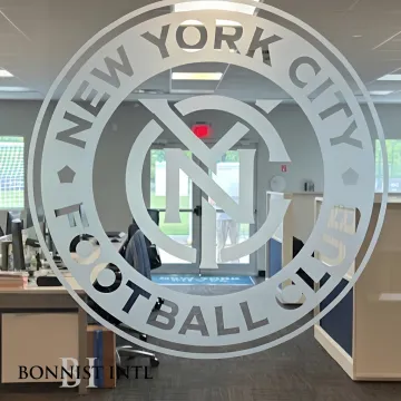 Adhesive translucent vinyl window graphics