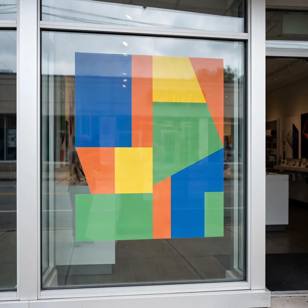 Double sided window clings on branded storefront glass