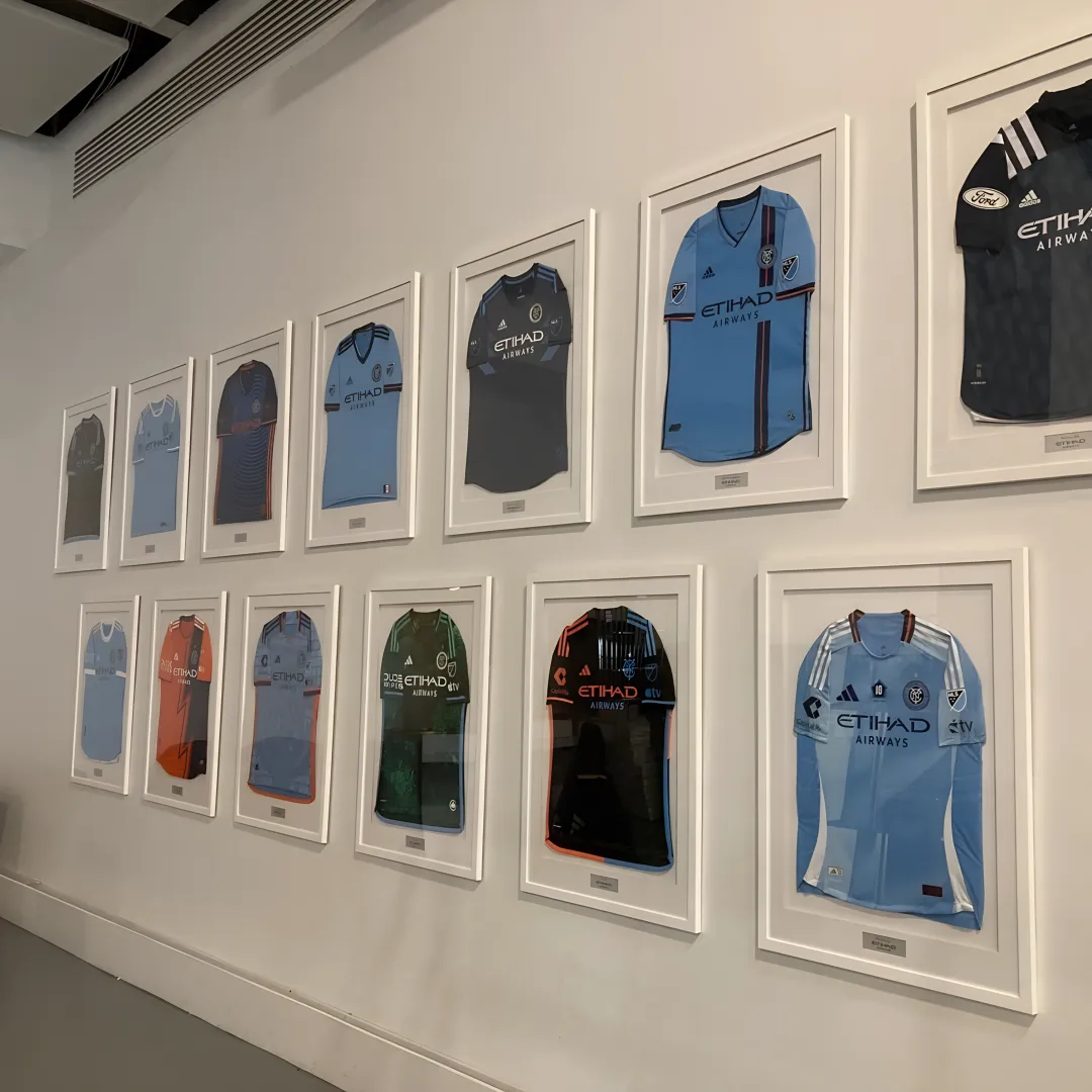 Custom framed artwork and memorabilia on display