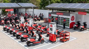Bounce Daily electric scooter rental fleet at charging hub with battery swap infrastructure